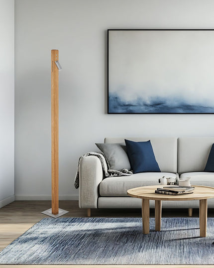 Stehleuchte aus Asteiche geölt, Modell Leonora, Leselicht, Nickel matt gebürstet, Trittschalter, Milieubild im Wohnzimmer, Leuchte steht neben Sofa