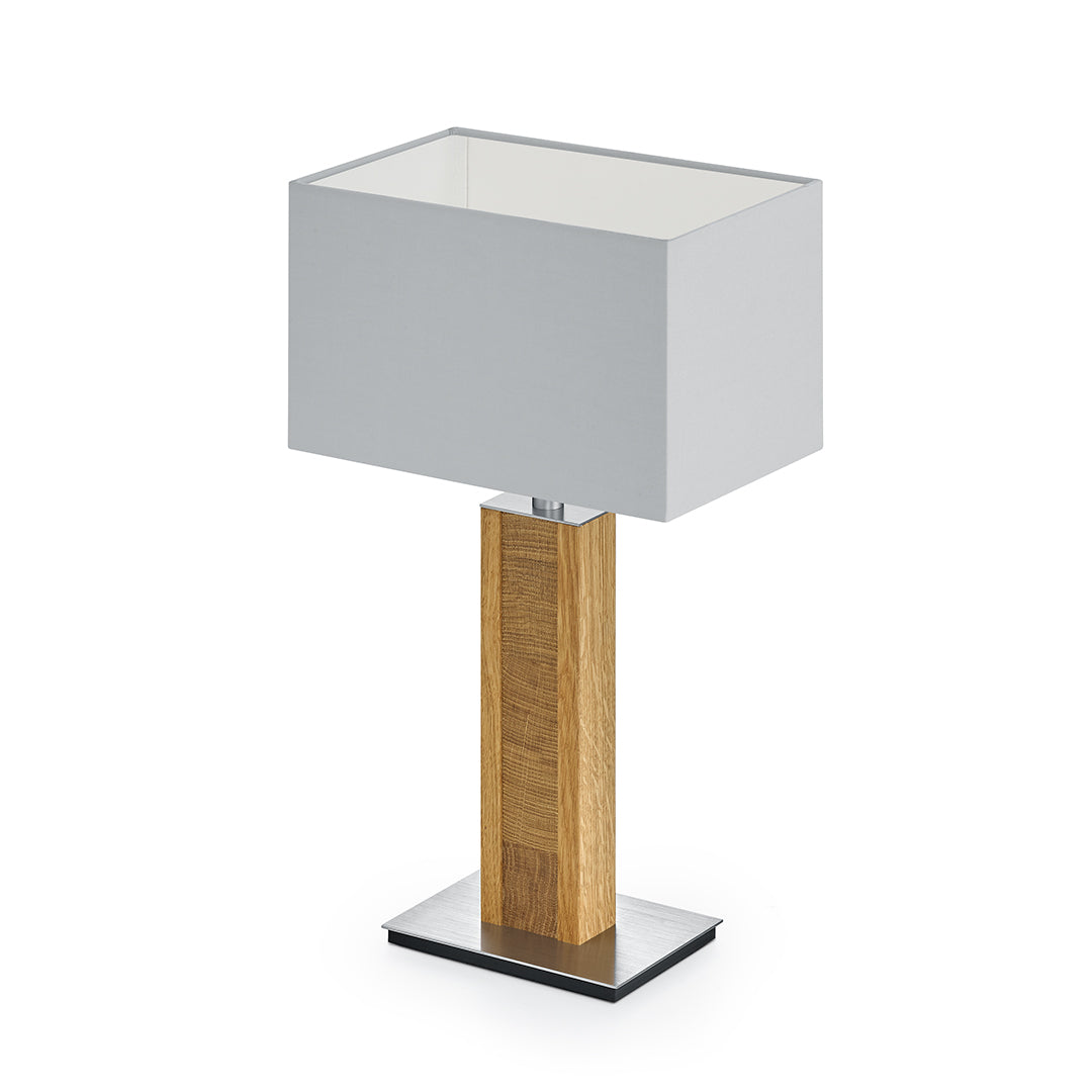 Karl K Quadra Tischlampe mit Kopfholzapplikation