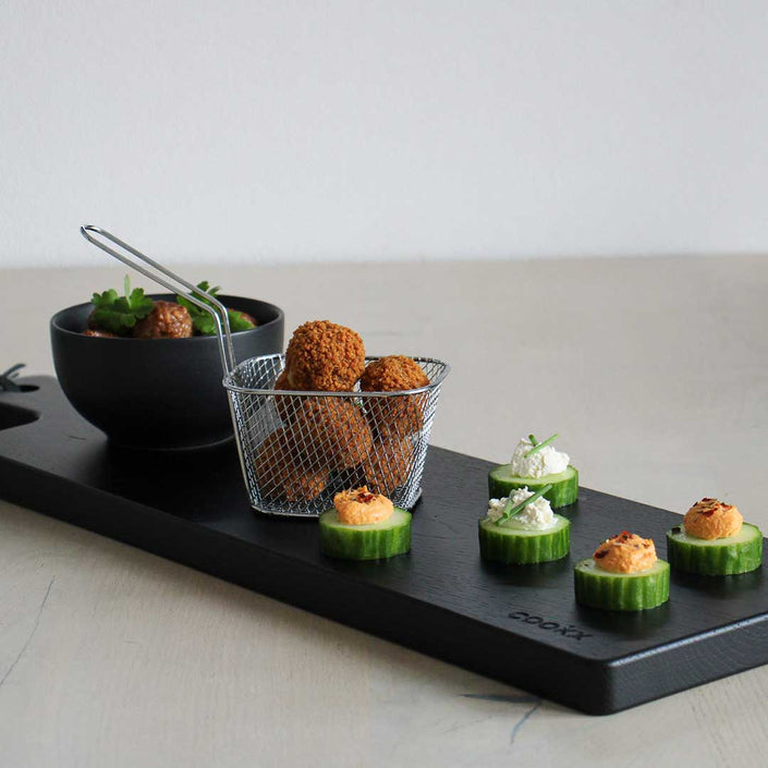 Serving board or cutting board made of black wood - size M